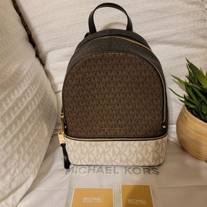 Michael Kors Signature Rhea Zip Medium Backpack. Very chic and fashionable!